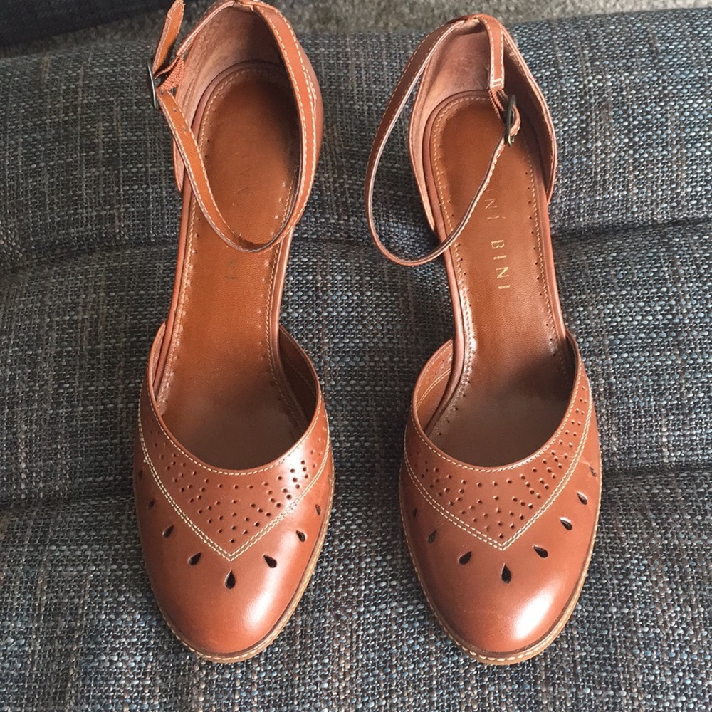 Light brown genuine leather heels.